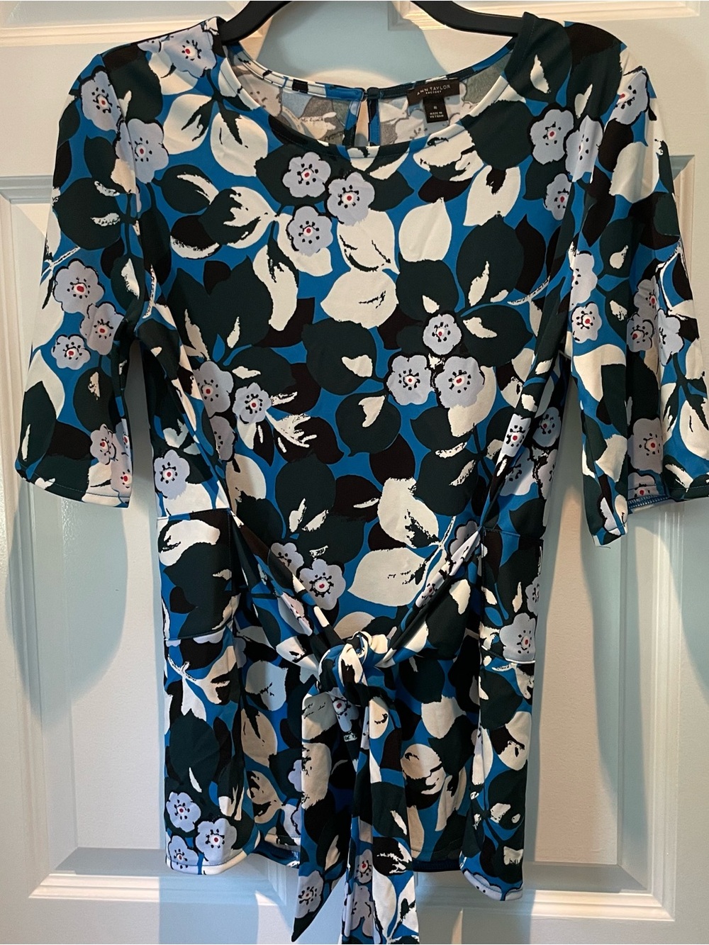 Ann Taylor blue floral top with front tie size Medium